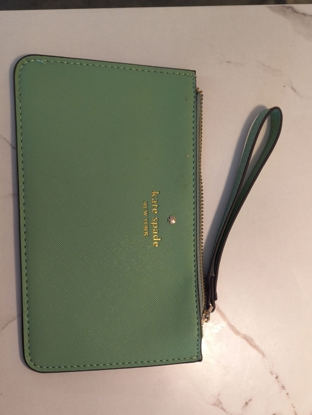 kate spade mint green wristlet clutch with gold logo